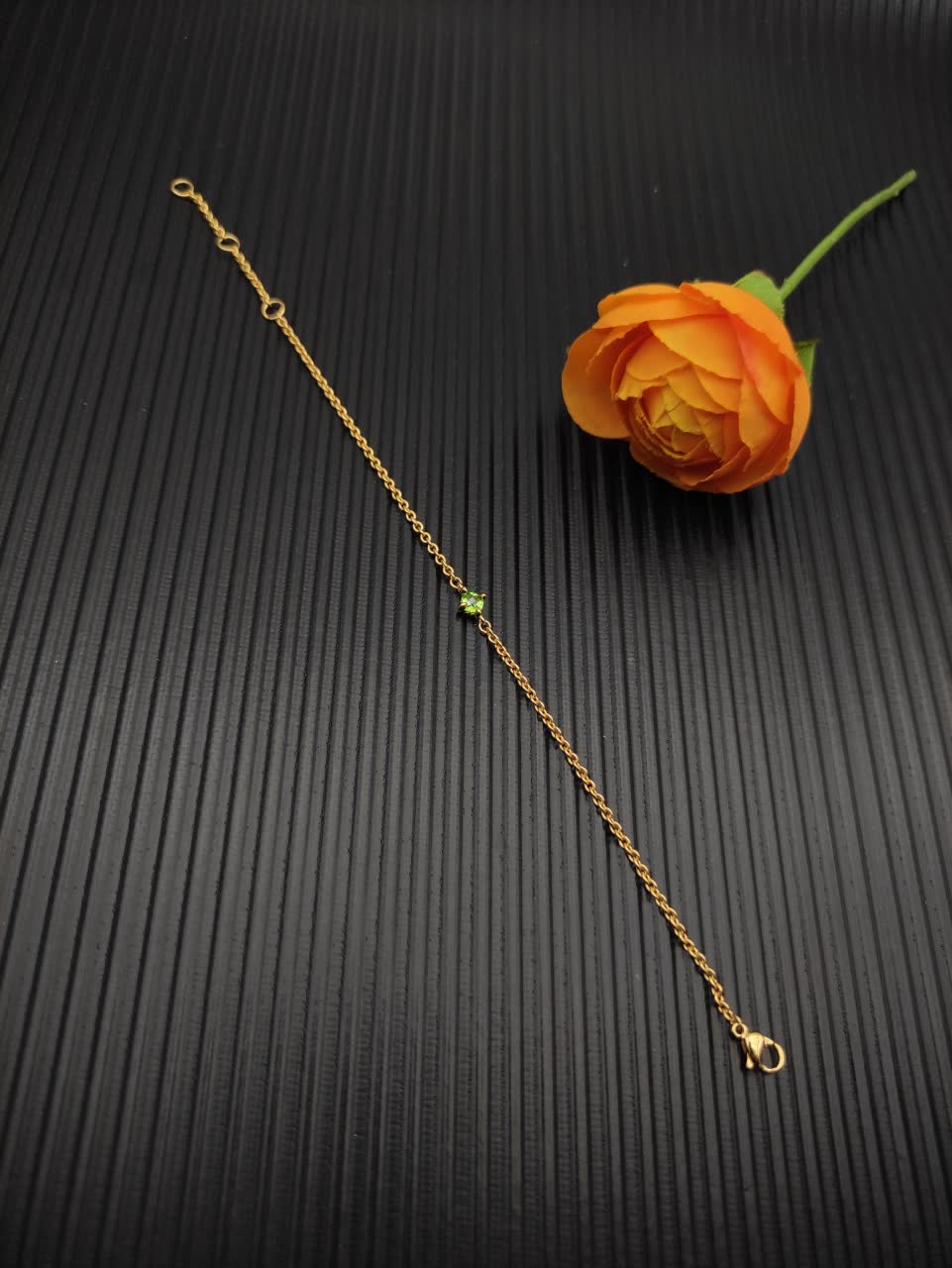 David Yurman Elegant Gold Bracelet with Green Gemstone